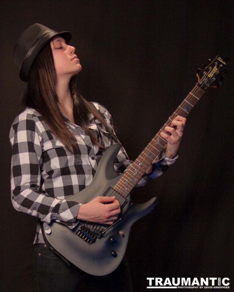 I saw an amazing picture on a web site of this female guitarist.  She was beautiful.  After a bit of searching, I was able to contact her and we did this shoot together.